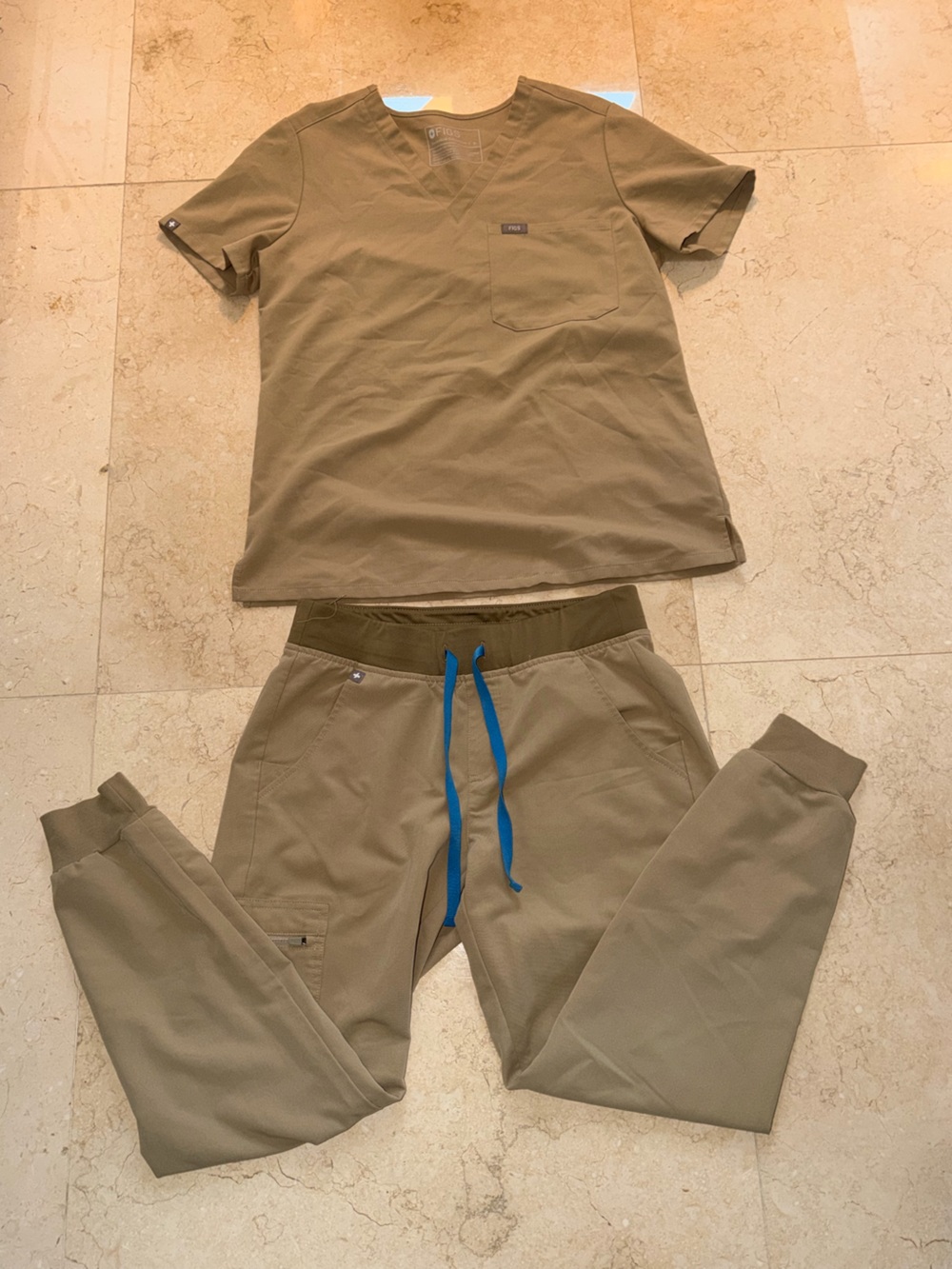 FIGS Catarina One-Pocket Scrub set in a khaki